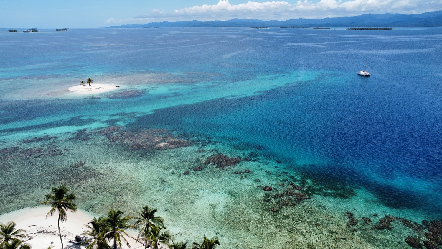 Tropical beach with clear blue waters